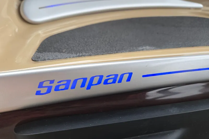 Slide: The Image of Close-up of 2013 Sanpan 2500 FE logo on boat surface. - 44