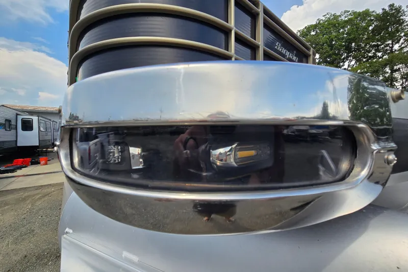 Slide: The Image of Close-up of a 2013 Sanpan 2500 FE boat's chrome detail with reflection. - 9