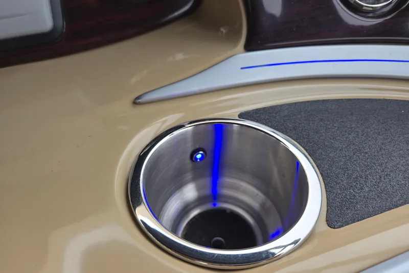 Slide: The Image of Cup holder with blue LED light on 2013 Sanpan 2500 FE boat dashboard. - 45