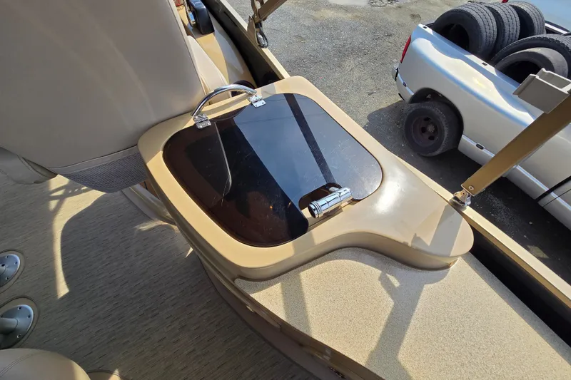 Slide: The Image of Interior of a 2013 Sanpan 2500 FE boat with a sleek storage compartment. - 39