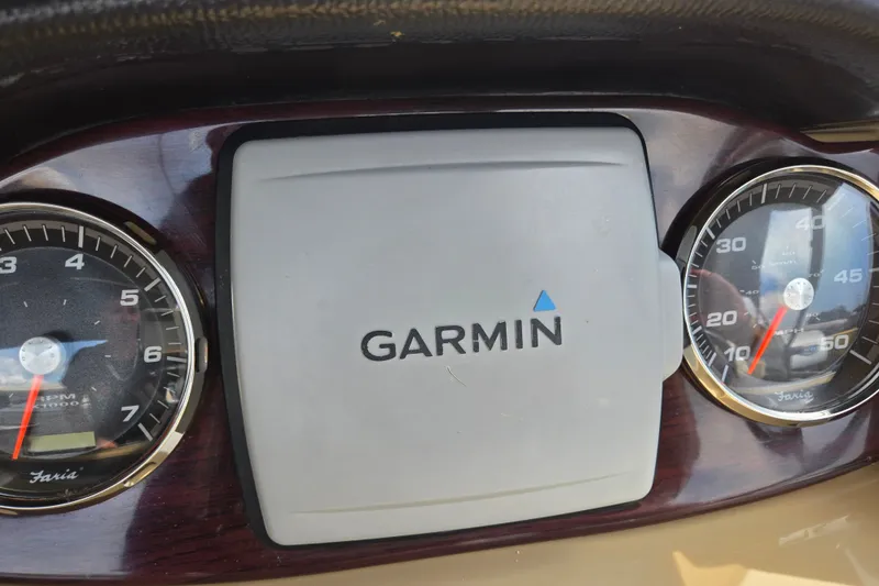 Slide: The Image of Dashboard of 2013 Sanpan 2500 FE with Garmin GPS and Faria gauges. - 30