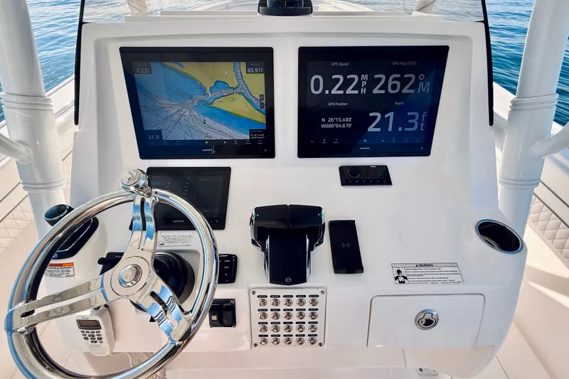 Slide: The Image of 2016 Intrepid 375 Center Console dashboard with navigation screens and steering wheel. - 66