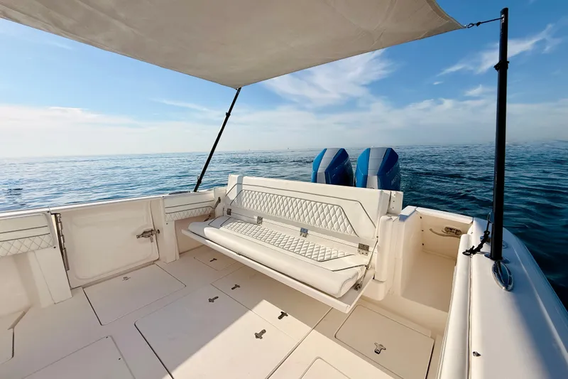 Slide: The Image of 2016 Intrepid 375 Center Console boat with seating, ocean view, and twin engines. - 56