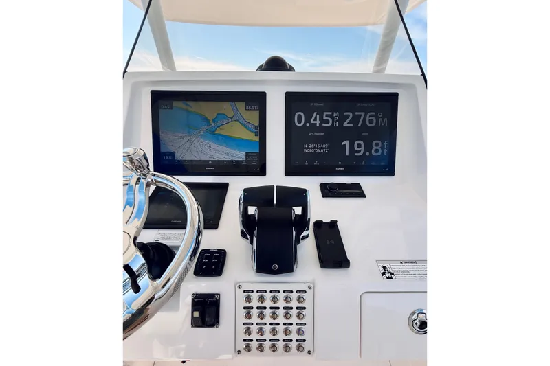 Slide: The Image of Intrepid 375 Center Console 2016 dashboard with navigation and control systems. - 67