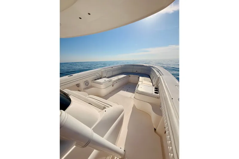 Slide: The Image of 2016 Intrepid 375 Center Console boat on open sea under clear sky. - 52