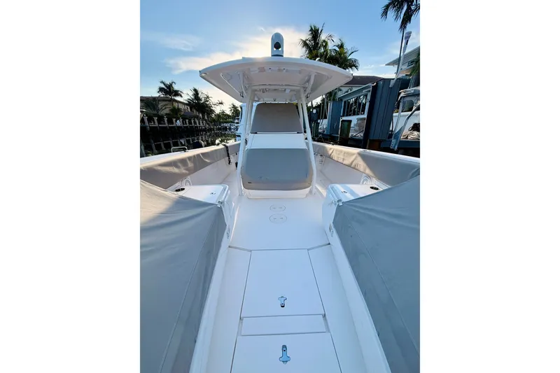 Slide: The Image of 2016 Intrepid 375 Center Console boat with sleek design and spacious deck. - 2