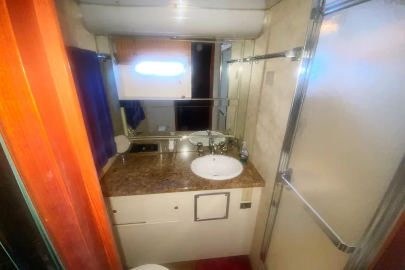 Slide: The Image of Bathroom interior of 1983 Hatteras 53 Motor Yacht with sink and shower. - 35