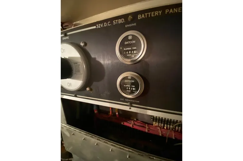 Slide: The Image of Control panel of a 1983 Hatteras 53 Motor Yacht with Datcon gauges. - 46