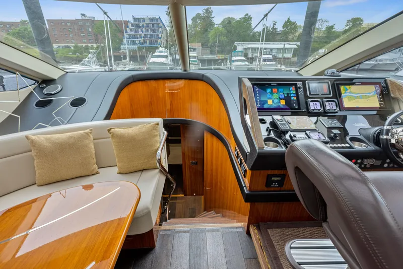 Slide: The Image of Interior of 2015 Sunseeker Predator 68 yacht with modern helm and seating area. - 20