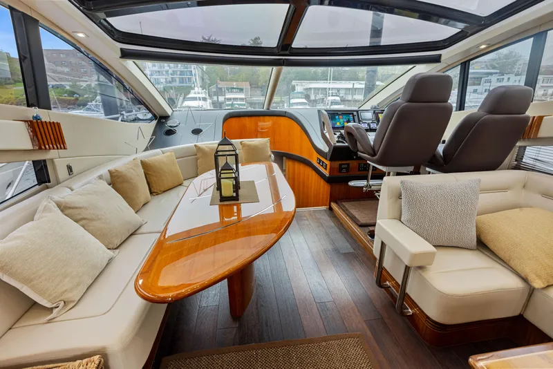 Slide: The Image of Luxurious interior of 2015 Sunseeker Predator 68 yacht with plush seating and modern helm. - 15