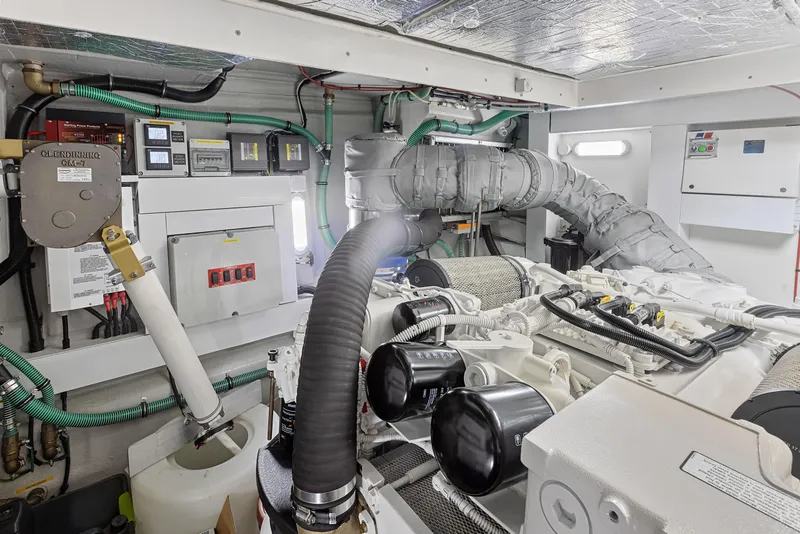 Slide: The Image of Engine room of a 2015 Sunseeker Predator 68 yacht with advanced machinery. - 36