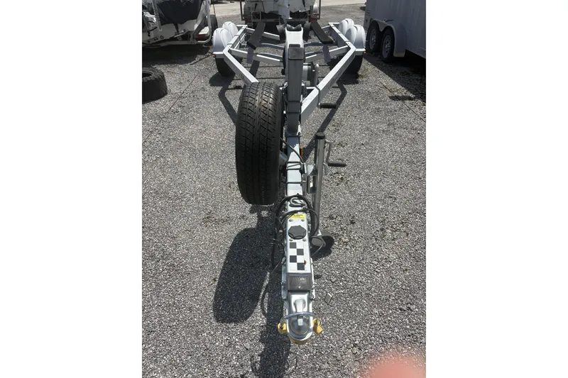 Slide: The Image of Trailer for 2018 Key West 219 FS boat on gravel surface. - 25