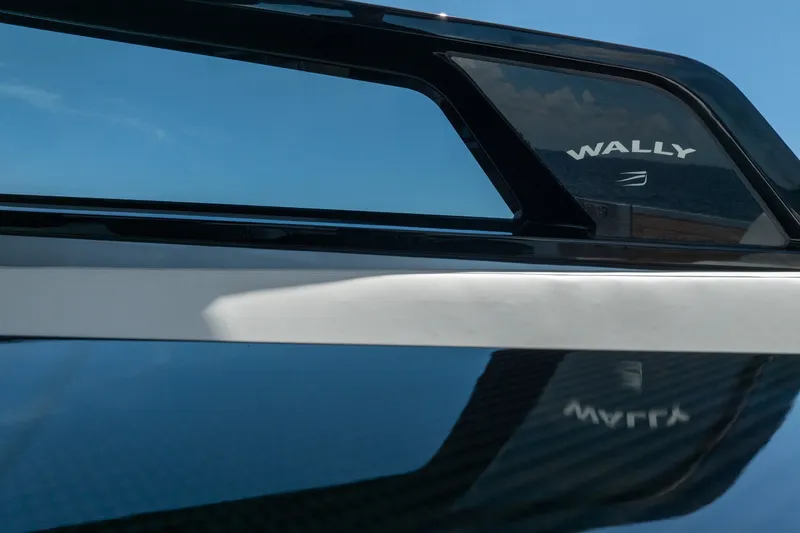 Slide: The Image of Close-up of 2022 Wally wallytender43X yacht with sleek design and reflection. - 32