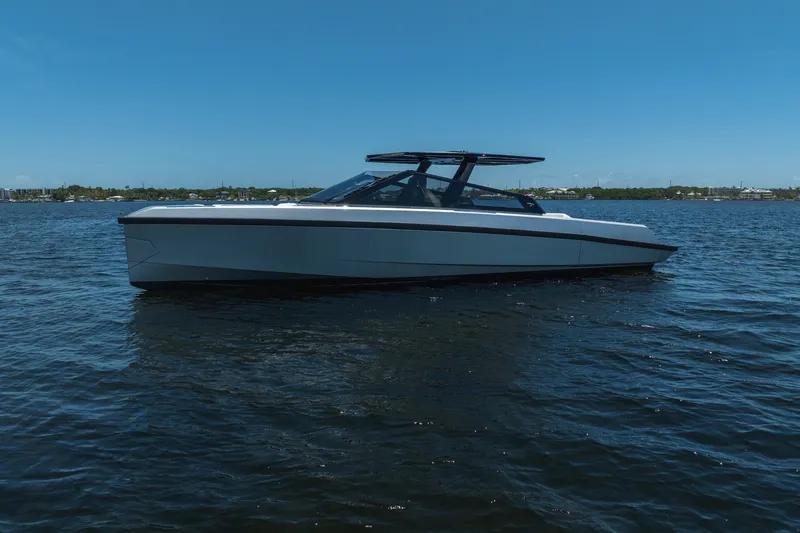 Slide: The Image of 2022 Wally wallytender43X luxury yacht on calm blue water under clear sky. - 52
