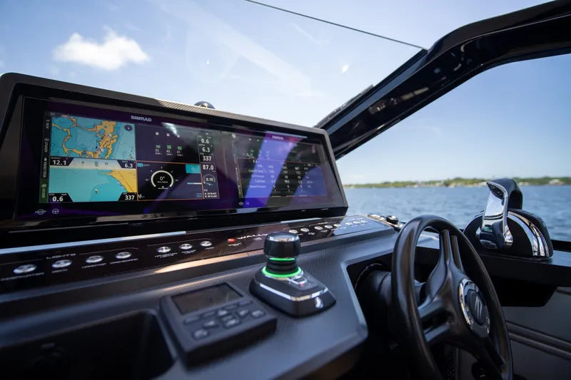 Slide: The Image of Cockpit of 2022 Wally wallytender43X with advanced navigation system and controls. - 25