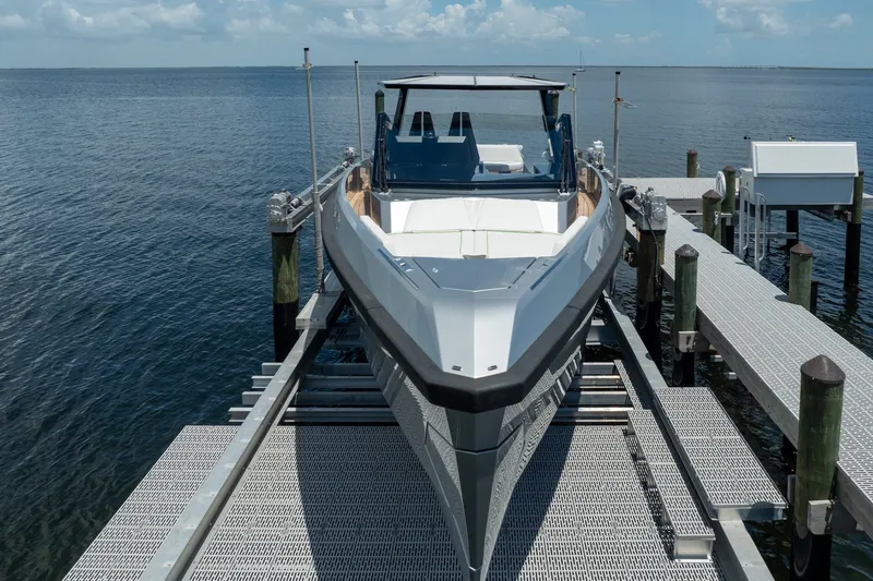 Slide: The Image of 2022 Wally wallytender43X yacht docked on a sunny day, showcasing sleek design. - 73