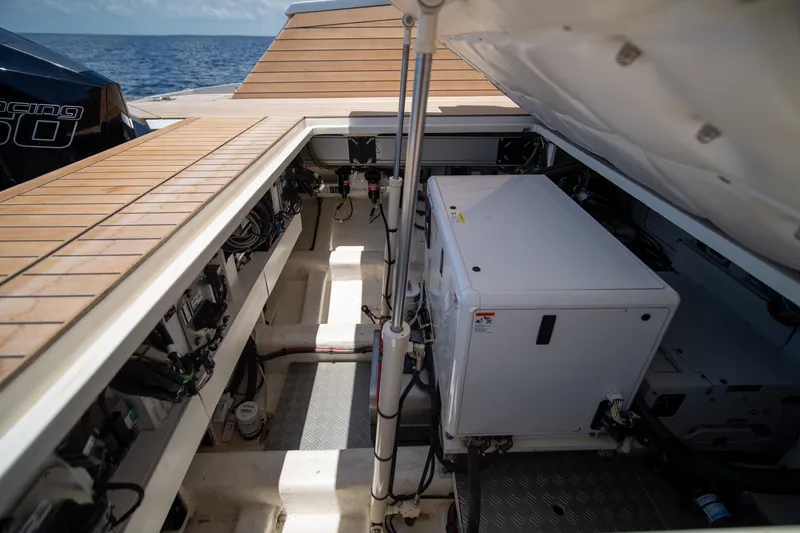 Slide: The Image of Engine compartment of 2022 Wally wallytender43X yacht with visible machinery and equipment. - 31