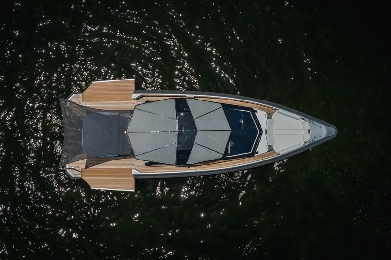 Slide: The Image of Overhead view of 2022 Wally wallytender43X yacht on shimmering water. - 61