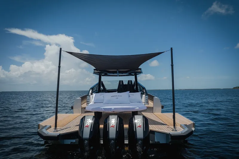 Slide: The Image of 2022 Wally wallytender43X luxury boat with canopy on open water. - 12