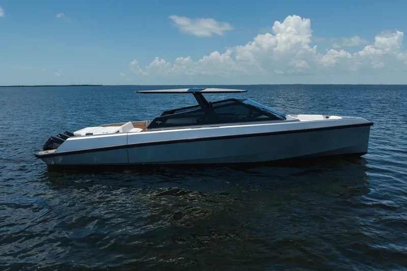 Slide: The Image of 2022 Wally wallytender43X luxury yacht on calm ocean waters under blue sky. - 46