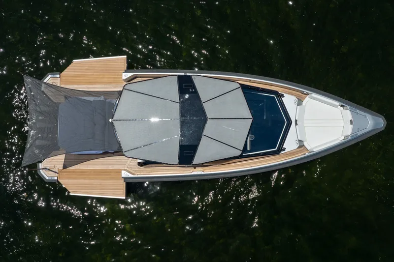 Slide: The Image of Top view of 2022 Wally wallytender43X yacht with sunshade on water. - 62