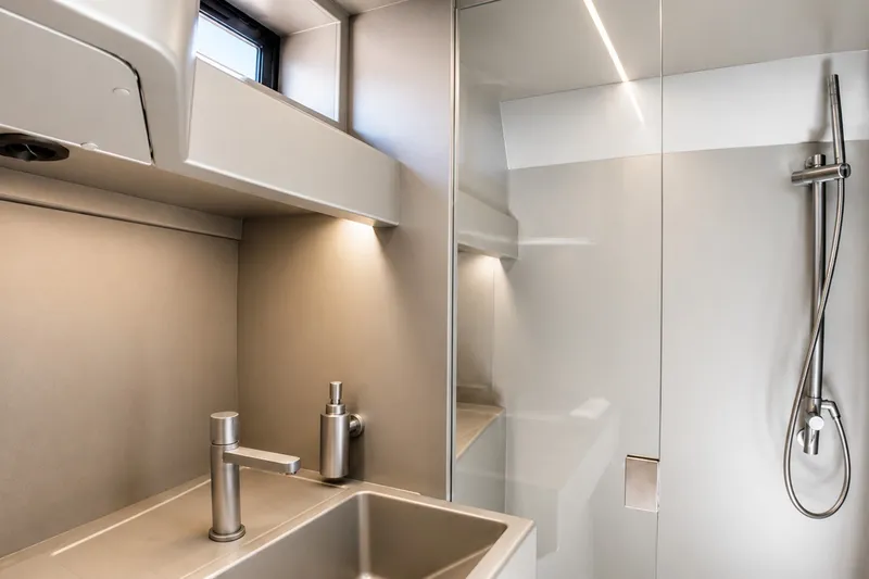 Slide: The Image of Modern bathroom interior of 2022 Wally wallytender43X yacht, featuring sleek fixtures and minimalist design. - 18