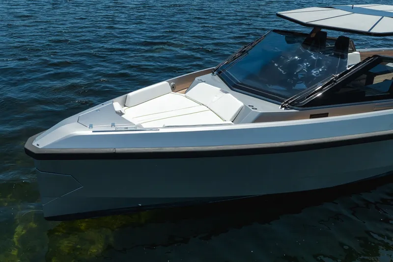 Slide: The Image of 2022 Wally wallytender43X luxury boat on calm water, showcasing sleek design. - 40