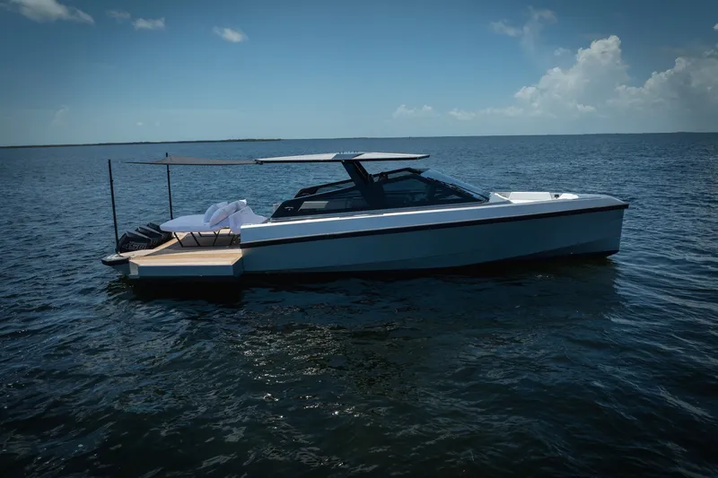 Slide: The Image of 2022 Wally wallytender43X luxury yacht on calm ocean waters under clear sky. - 60