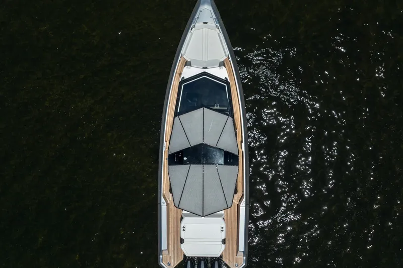 Slide: The Image of Aerial view of 2022 Wally wallytender43X yacht on dark water. - 54