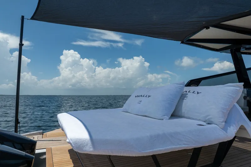 Slide: The Image of Luxury sunbed on 2022 Wally wallytender43X yacht, ocean view, clear sky. - 15