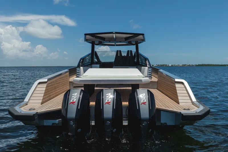 Slide: The Image of 2022 Wally wallytender43X boat with four powerful engines on open water. - 44