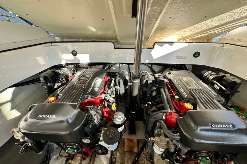 Slide: The Image of 2010 Cobalt 296 boat engine compartment with dual Volvo Penta engines. - 23