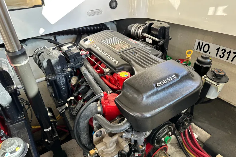 Slide: The Image of Engine compartment of a 2010 Cobalt 296 boat with Volvo Penta engine. - 22