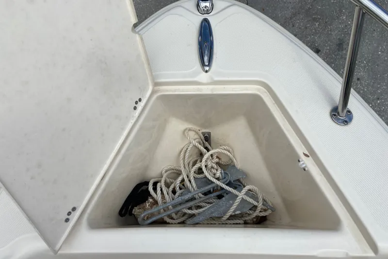Slide: The Image of Anchor storage compartment on a 2021 Scout 175 Sport Dorado boat. - 19