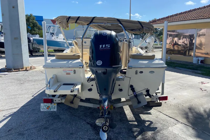 Slide: The Image of 2021 Scout 175 Sport Dorado boat with 115 horsepower engine, parked outdoors. - 3