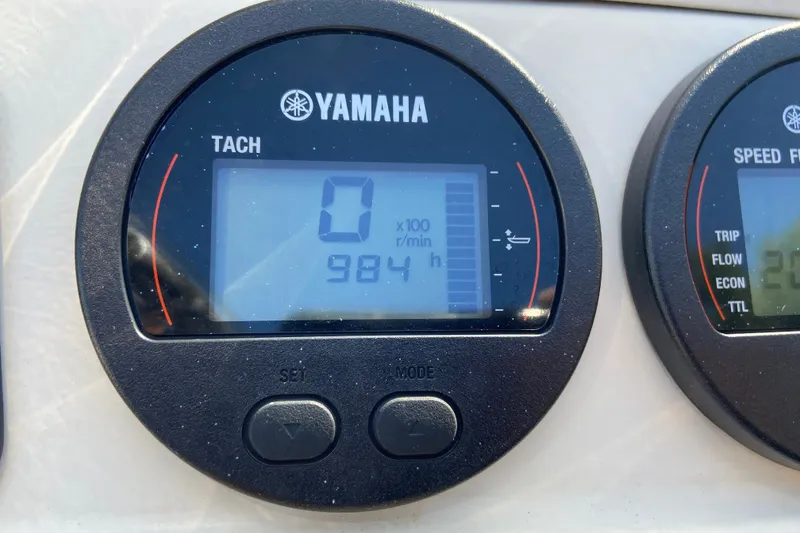 Slide: The Image of Yamaha tachometer display on 2021 Scout 175 Sport Dorado boat, showing 0 RPM and 98.4 hours. - 11