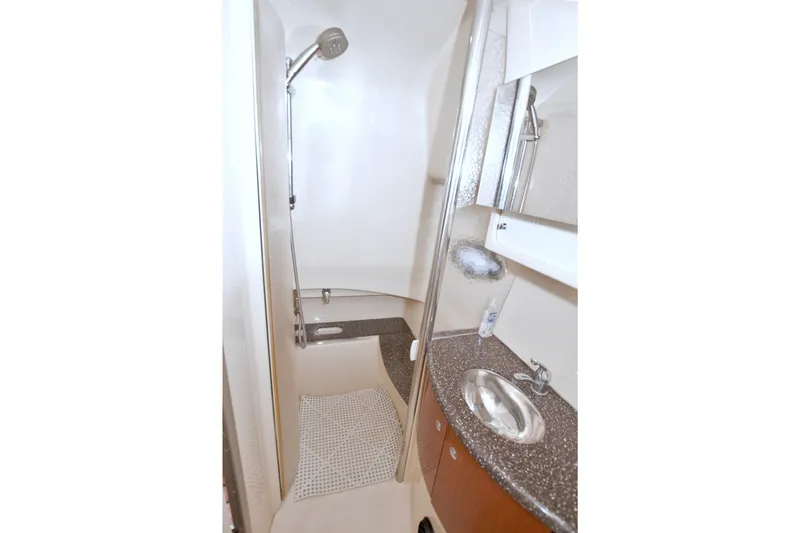 Slide: The Image of 2008 Formula 40 Performance Cruiser bathroom with shower, sink, and modern fixtures. - 46