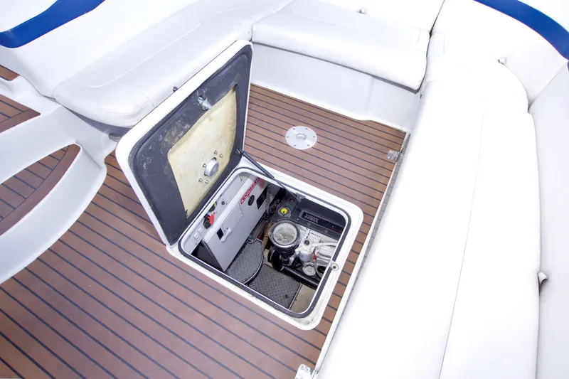 Slide: The Image of 2008 Formula 40 Performance Cruiser engine compartment with open hatch on teak deck. - 48