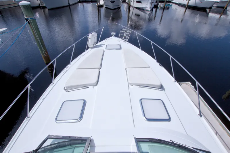 Slide: The Image of 2008 Formula 40 Performance Cruiser docked, showcasing sleek deck design and marina setting. - 25