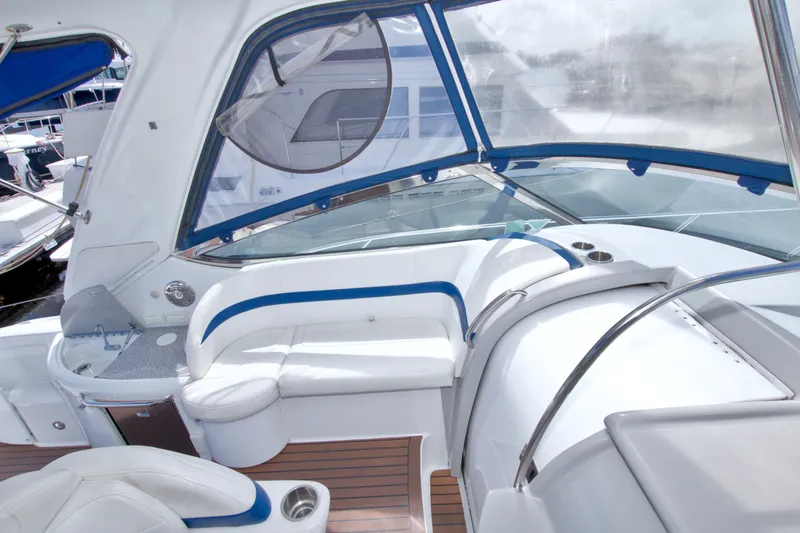 Slide: The Image of 2008 Formula 40 Performance Cruiser interior with white seating and blue accents. - 20