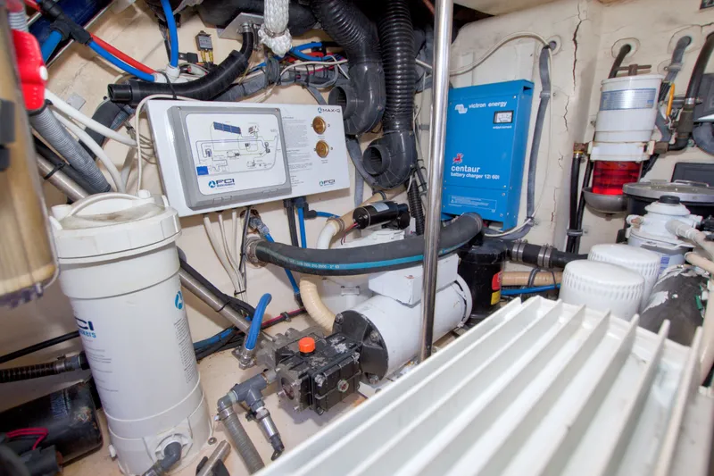 Slide: The Image of Engine room of a 2008 Formula 40 Performance Cruiser with various mechanical components. - 59