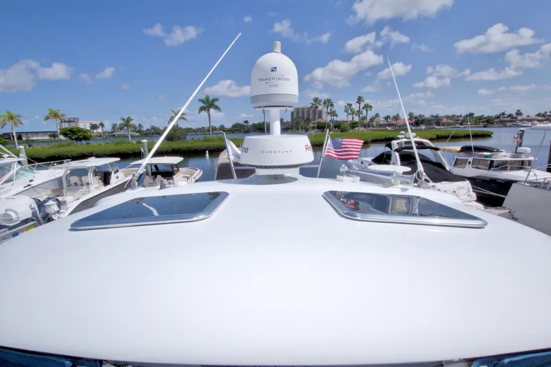 Slide: The Image of 2008 Formula 40 Performance Cruiser docked, featuring radar and American flag. - 29