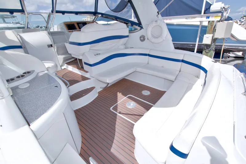 Slide: The Image of Luxurious 2008 Formula 40 Performance Cruiser interior with white seating and wood flooring. - 17
