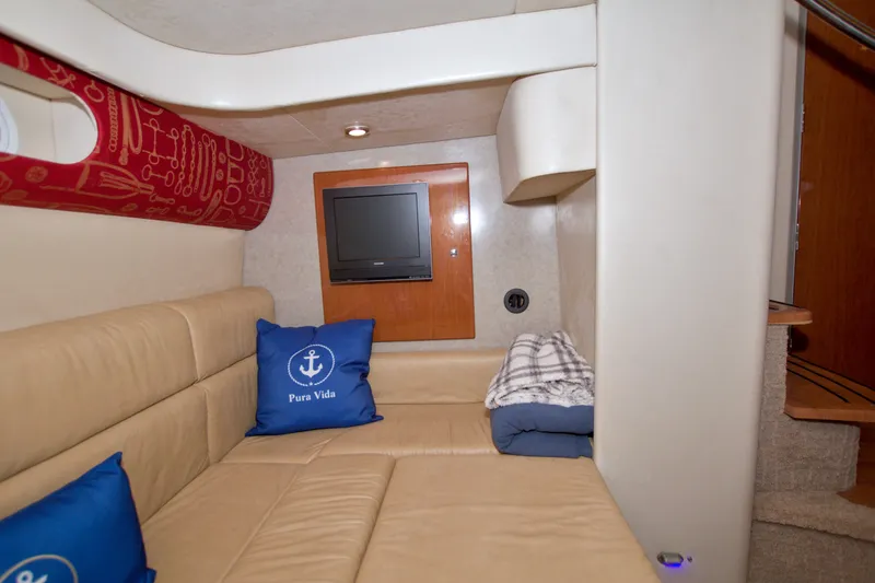 Slide: The Image of Interior of 2008 Formula 40 Performance Cruiser with cozy seating and nautical decor. - 43