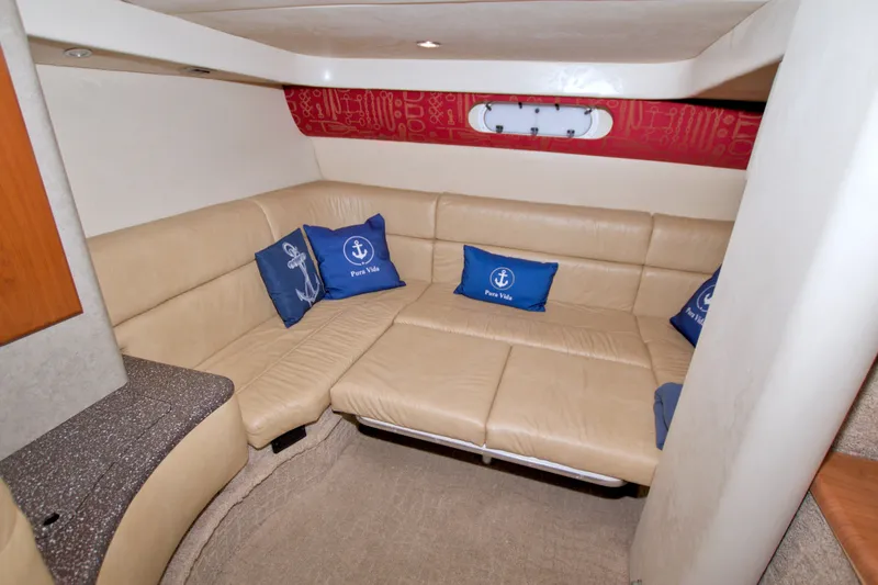 Slide: The Image of Luxurious interior of 2008 Formula 40 Performance Cruiser with beige seating and nautical pillows. - 42