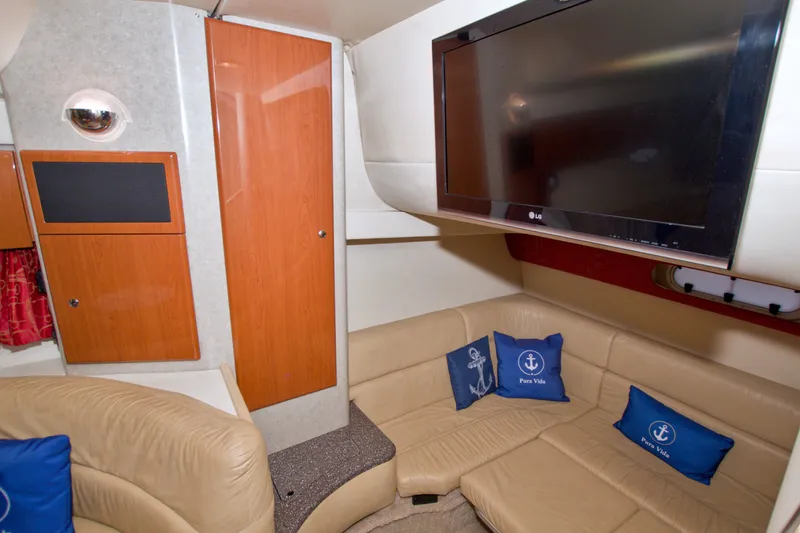 Slide: The Image of Interior of 2008 Formula 40 Performance Cruiser with beige seating and wall-mounted TV. - 41