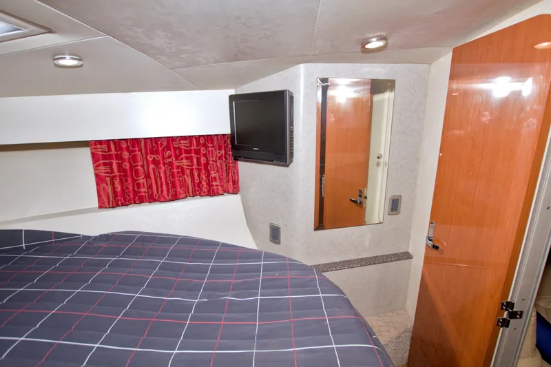 Slide: The Image of Interior of 2008 Formula 40 Performance Cruiser with bed, TV, and mirror. - 38