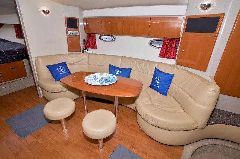 Slide: The Image of Luxurious interior of 2008 Formula 40 Performance Cruiser with leather seating and wooden accents. - 32