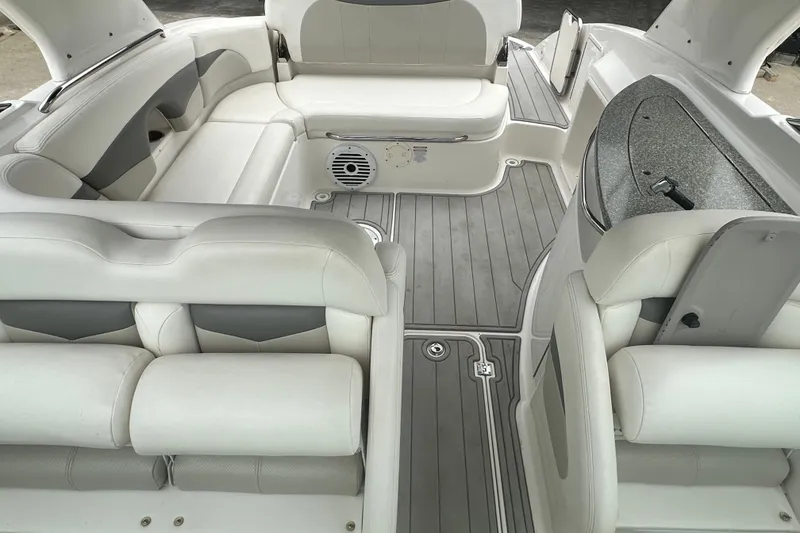 Slide: The Image of Interior of 2007 Chaparral 276 SSX boat with white seating and gray flooring. - 13