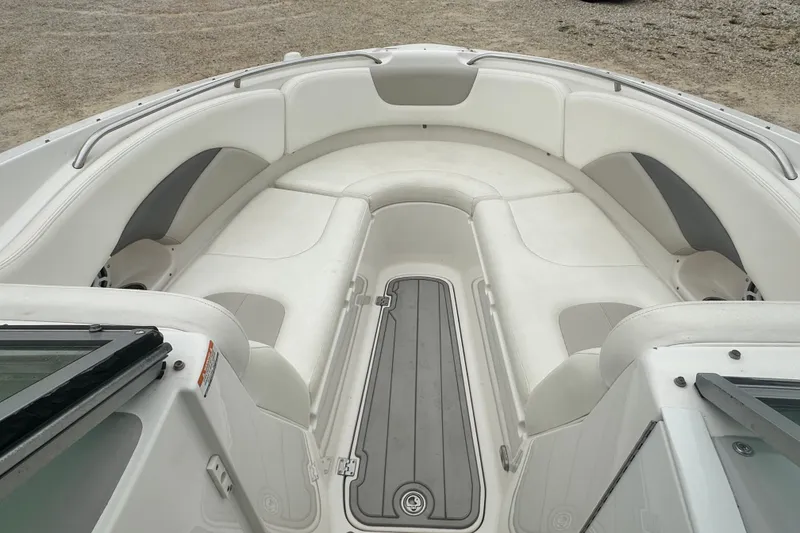 Slide: The Image of 2007 Chaparral 276 SSX boat interior with white seating and gray accents. - 14